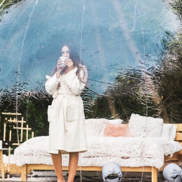 woman enjoying coffee in geo dome